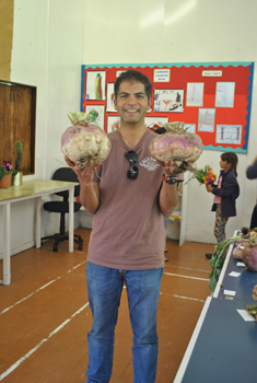 Aniket holding two turnips