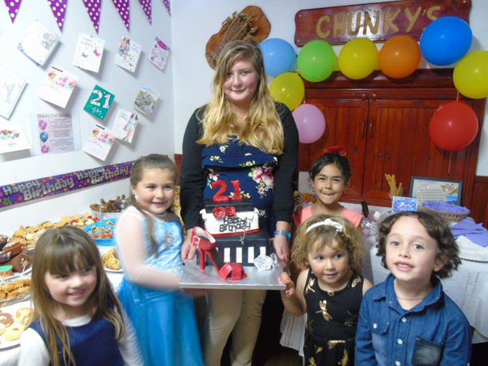 Leanne Swain with her godchildren at her 21st birthday party.