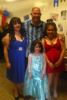 Paul Repetto with wife and daughters