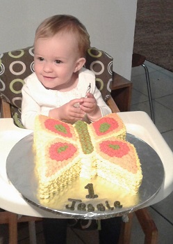 Jessie Squibb and her 1st birthday cake.
