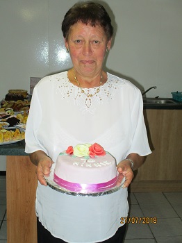 Minnie Glass with her 70th birthday cake.
