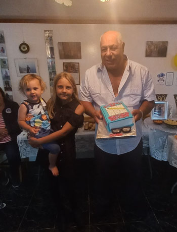 Ches Lavarello with his great grandchildren Seren and Savanah Green