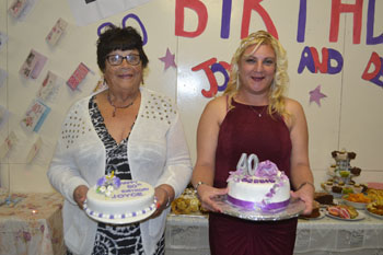 Joyce Hagan and Debbie Swain with their birthday cakes