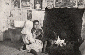 1937 interior of a Tristan house with newpaper wallpaper