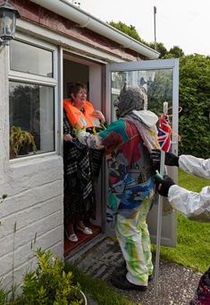 Accosting Louise Kendall at the front door of the Residency.