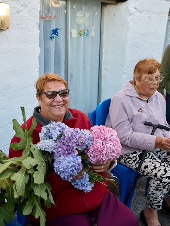 Dilys Green presented with flowers and foliage.