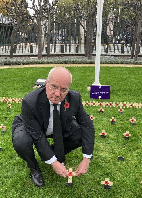 Chris planting the Tristan cross in the Speaker's Garden of Remembrance