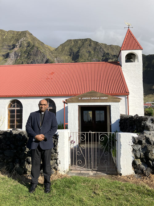 Father Tom Thomas in front of St Joseph's Catholic Church on Tristan da Cunha