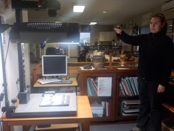 Practicing with the photography equipment in the new archive room.