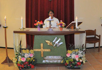 Anne leading a service in St Joseph's Catholic Church