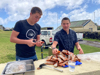 Tristan and Kieran Glass preparing the lobster