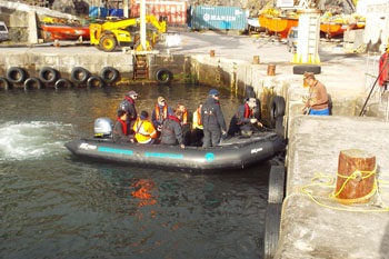 Passengers landing in Calshot Harbour.