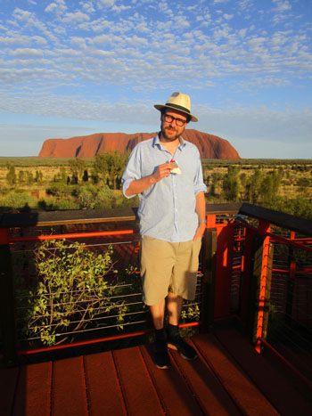 Jame Witt with his Christmas Love Sock at Uluru, Australia