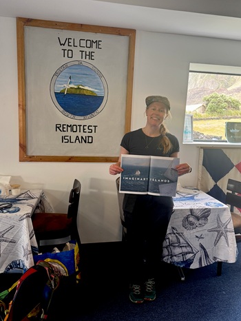 Kate Schnippering holding a copy of her article on her previous visits to Tristan. Photo: Kelly Green