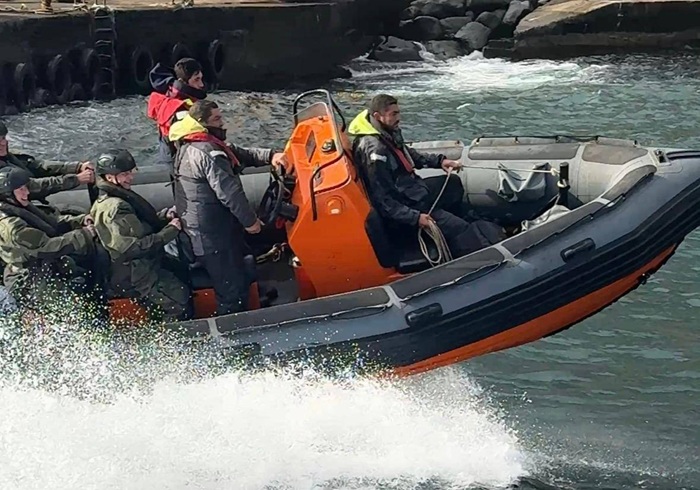The new medics look like they are enjoying the rough conditions in the harbour.
