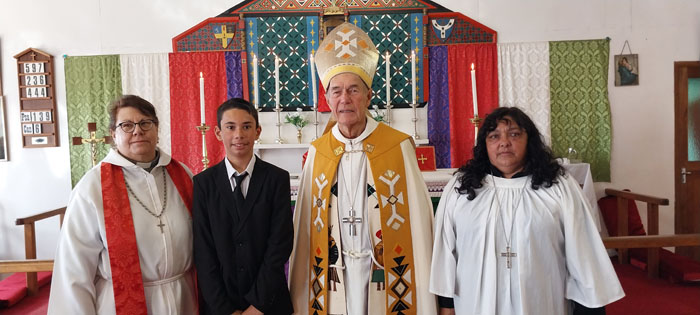 Lucas Swain with (L-R) Rev Margaret Van den Berg, Bishop Geoff Davies, and Lay Reader Carlene Glass-Green.