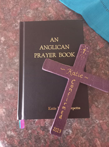Personally inscribed prayer books and crosses were given to each candidate.
