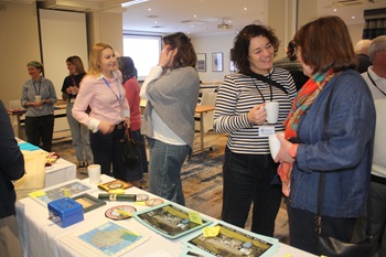 Isolde Muller, Antje Steinfurth and Penny Granger at the souvenir stall. Photo: Mike Faulds