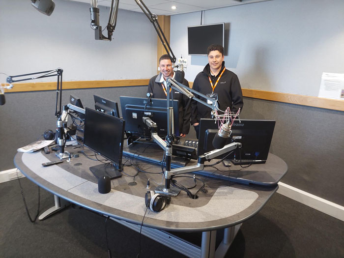 Nicky and Ryan Swain at the BFBS radio broadcasting station.