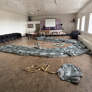 Parachutes laid out in Prince Philip Hall