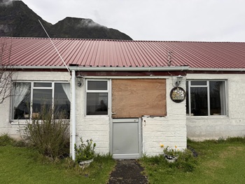 The Residency gets a new front door - Before - outside