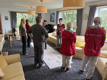 Louise Kendall speaking to Silver Cloud passengers in The Residency