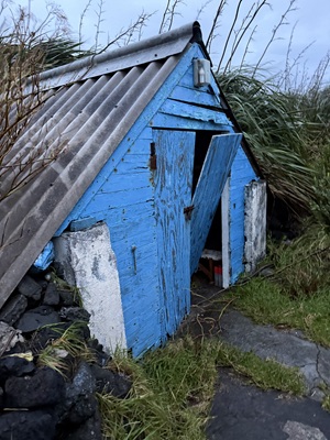 Damage to a family storage hut.