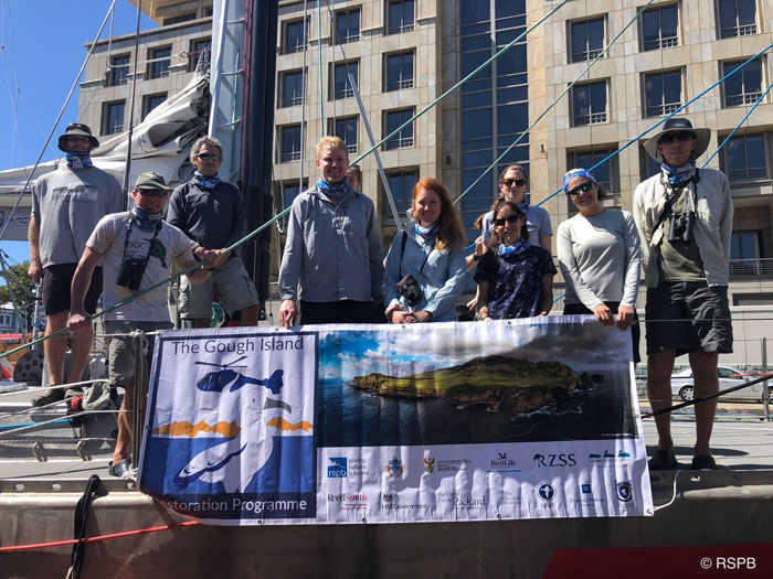 Second Gough team displaying their banner in Cape Town harbour