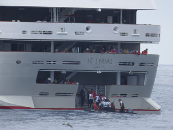 Passengers re-embarking at Le Lyrial's stern.