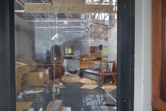 Chaos and water damage viewed from the entrance of the Post Office and Tourism Centre