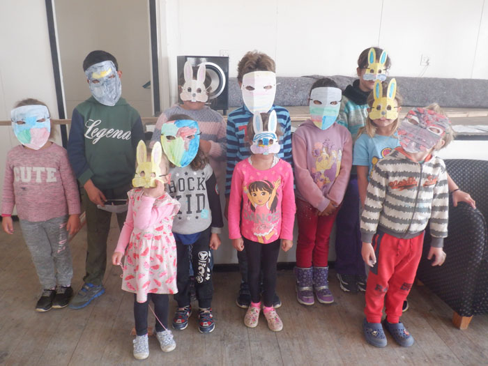 Tristan school children wearing masks.