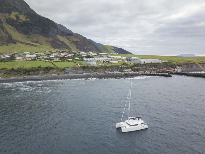 The catamaran Maitai anchored off Calshot Harbour, Tristan da Cunha