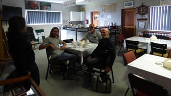 The crew of the yacht Ronin enjoying refreshments in Café da Cunha