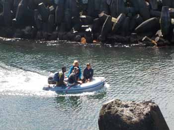 The crew of the yacht Nina Pope coming ashore at Tristan da Cunha
