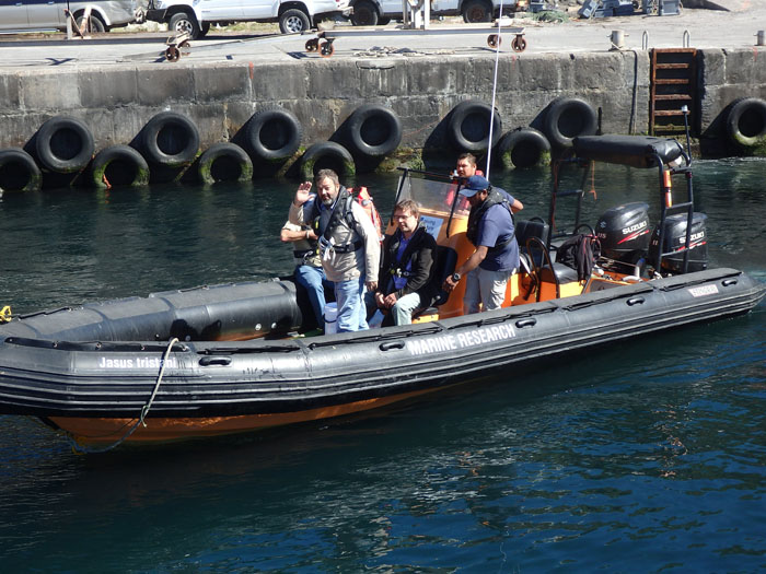The crew from the SV Urchin being brought into Calshot Harbour in the Conservation RIB