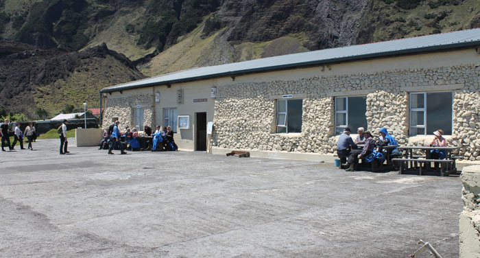 Visitors arriving at Prince Philip Hall and the Albatross Bar during independent hiking around the village