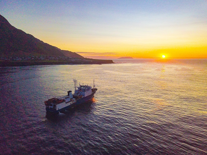 Sunset for the MFV Geo Searcher, pictured off the Settlement at Tristan da Cunha.