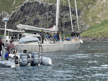 The Conservation RIBs pick up passengers from the yacht off Inaccessible
