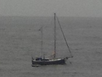 Yacht Karma at anchor off the settlement.